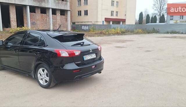 Чорний Міцубісі Lancer, об'ємом двигуна 1.8 л та пробігом 213 тис. км за 6200 $, фото 11 на Automoto.ua