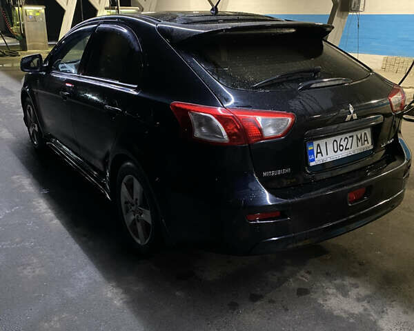 Черный Мицубиси Лансер, объемом двигателя 1.8 л и пробегом 220 тыс. км за 5500 $, фото 1 на Automoto.ua