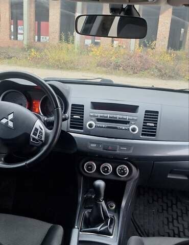 Чорний Міцубісі Lancer, об'ємом двигуна 1.8 л та пробігом 213 тис. км за 6200 $, фото 3 на Automoto.ua