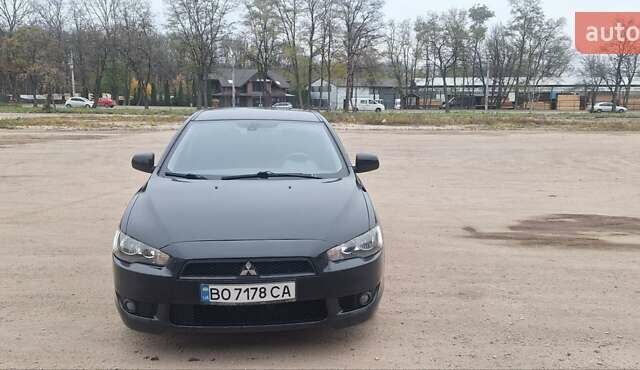 Чорний Міцубісі Lancer, об'ємом двигуна 1.8 л та пробігом 213 тис. км за 6200 $, фото 8 на Automoto.ua