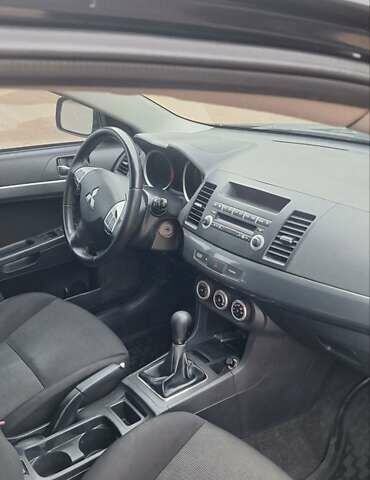 Чорний Міцубісі Lancer, об'ємом двигуна 1.8 л та пробігом 213 тис. км за 6200 $, фото 1 на Automoto.ua