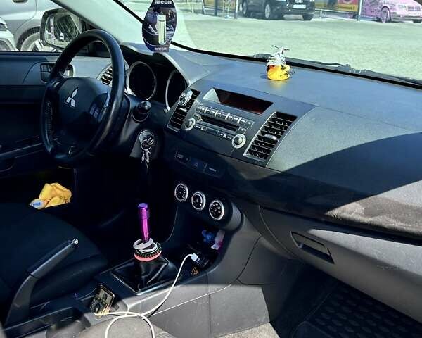 Чорний Міцубісі Lancer, об'ємом двигуна 1.8 л та пробігом 170 тис. км за 6700 $, фото 19 на Automoto.ua