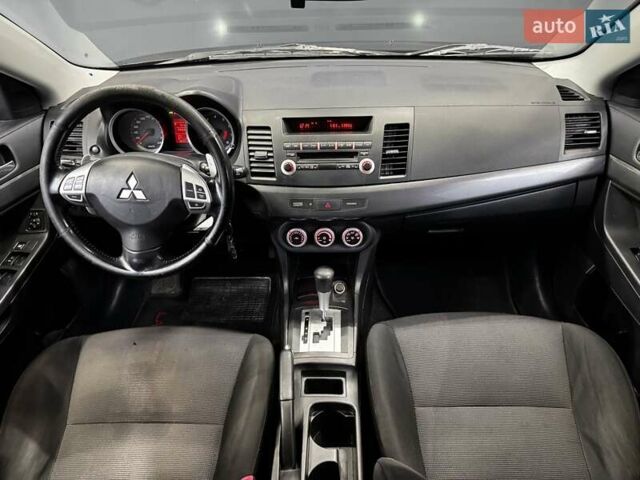 Черный Мицубиси Лансер, объемом двигателя 1.8 л и пробегом 362 тыс. км за 5500 $, фото 20 на Automoto.ua