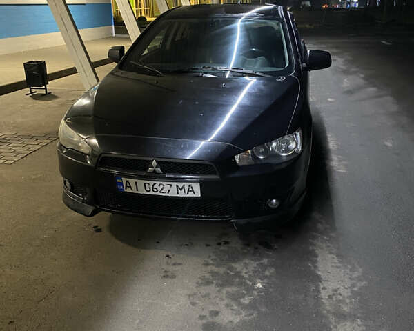 Черный Мицубиси Лансер, объемом двигателя 1.8 л и пробегом 220 тыс. км за 5500 $, фото 11 на Automoto.ua