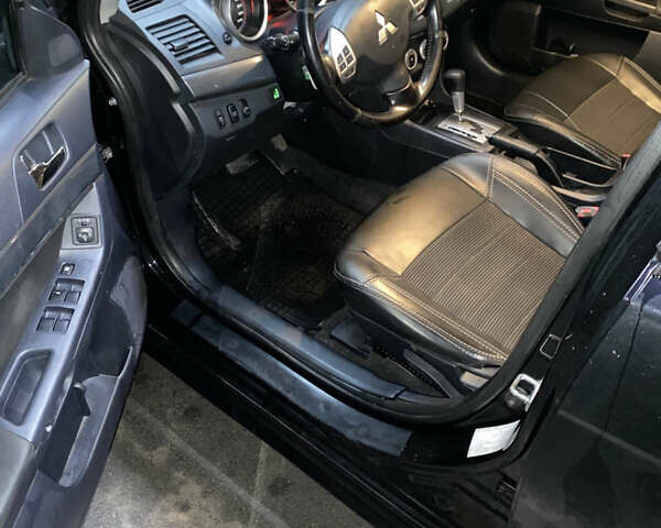 Черный Мицубиси Лансер, объемом двигателя 1.8 л и пробегом 220 тыс. км за 5500 $, фото 3 на Automoto.ua