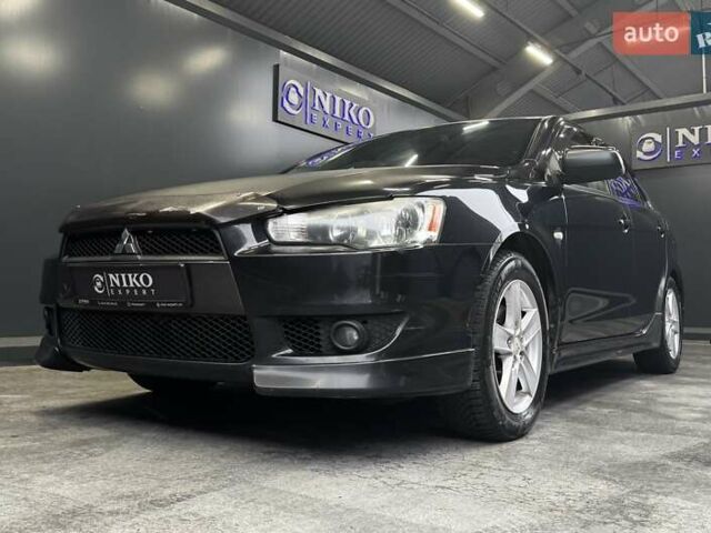 Черный Мицубиси Лансер, объемом двигателя 1.8 л и пробегом 362 тыс. км за 5500 $, фото 2 на Automoto.ua
