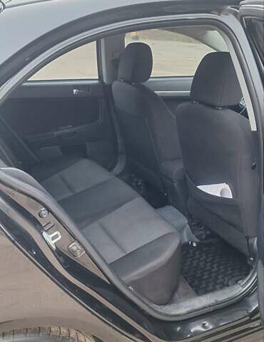 Чорний Міцубісі Lancer, об'ємом двигуна 1.8 л та пробігом 213 тис. км за 6200 $, фото 10 на Automoto.ua