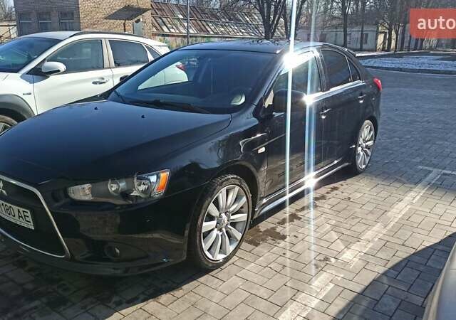 Чорний Міцубісі Lancer, об'ємом двигуна 1.8 л та пробігом 218 тис. км за 8500 $, фото 19 на Automoto.ua