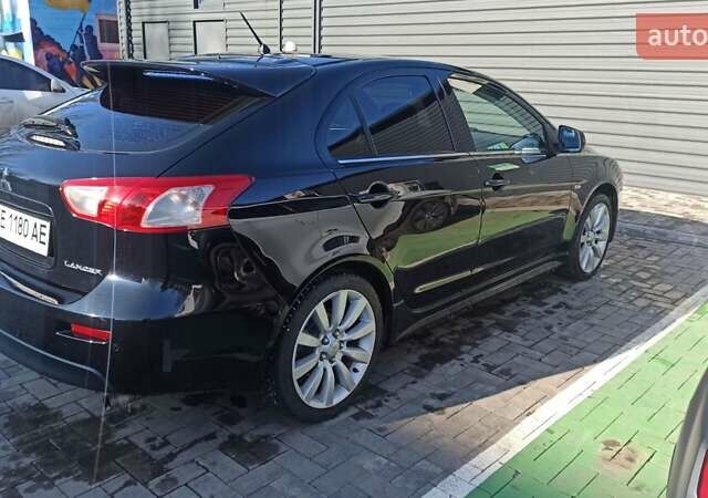 Чорний Міцубісі Lancer, об'ємом двигуна 1.8 л та пробігом 218 тис. км за 8500 $, фото 8 на Automoto.ua