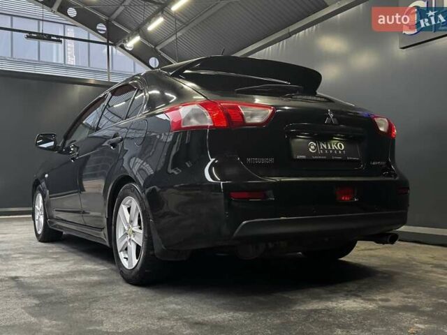 Черный Мицубиси Лансер, объемом двигателя 1.8 л и пробегом 362 тыс. км за 5500 $, фото 8 на Automoto.ua