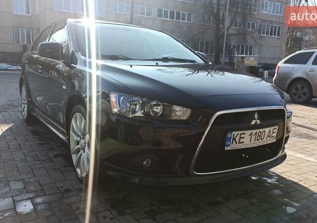 Чорний Міцубісі Lancer, об'ємом двигуна 1.8 л та пробігом 218 тис. км за 8500 $, фото 17 на Automoto.ua