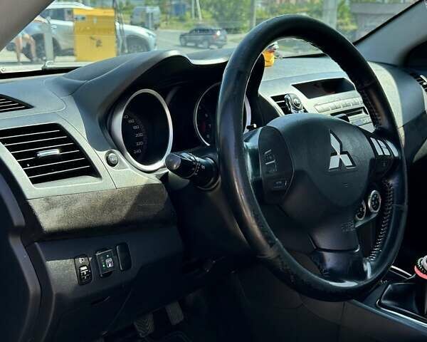 Чорний Міцубісі Lancer, об'ємом двигуна 1.8 л та пробігом 170 тис. км за 6700 $, фото 12 на Automoto.ua