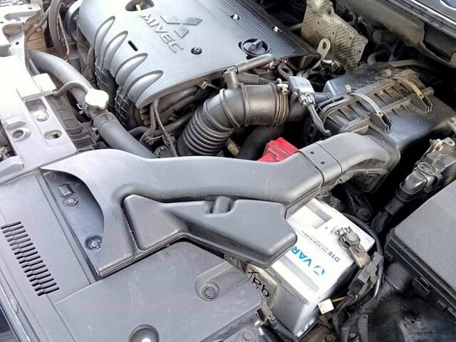 Чорний Міцубісі Lancer, об'ємом двигуна 1.8 л та пробігом 208 тис. км за 6800 $, фото 4 на Automoto.ua