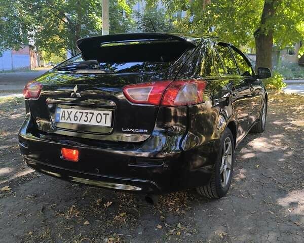 Черный Мицубиси Лансер, объемом двигателя 1.8 л и пробегом 370 тыс. км за 6800 $, фото 9 на Automoto.ua