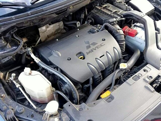 Чорний Міцубісі Lancer, об'ємом двигуна 1.8 л та пробігом 208 тис. км за 6800 $, фото 5 на Automoto.ua
