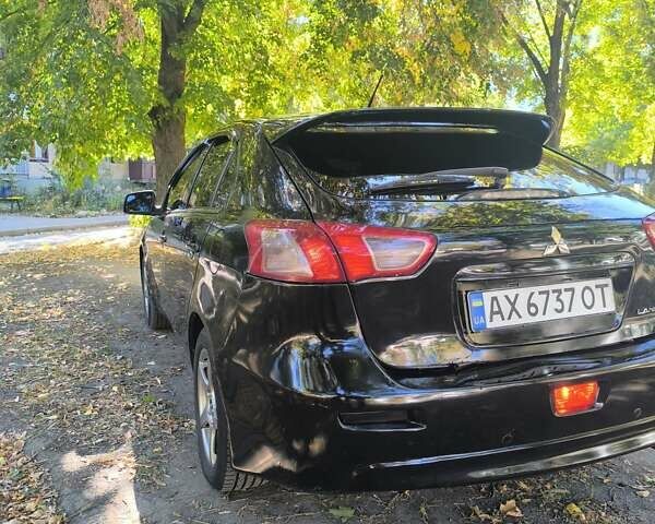Черный Мицубиси Лансер, объемом двигателя 1.8 л и пробегом 370 тыс. км за 6800 $, фото 13 на Automoto.ua