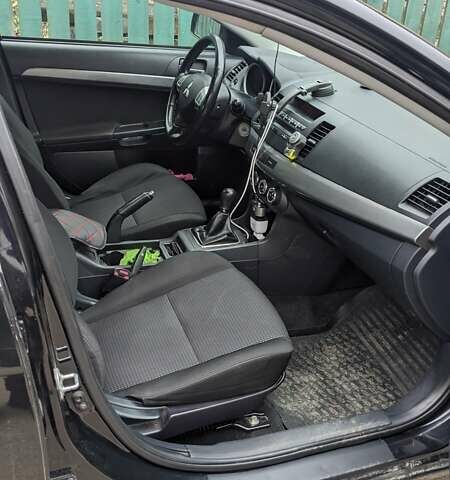 Черный Мицубиси Лансер, объемом двигателя 1.8 л и пробегом 210 тыс. км за 7300 $, фото 5 на Automoto.ua