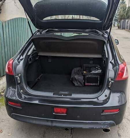 Черный Мицубиси Лансер, объемом двигателя 1.8 л и пробегом 210 тыс. км за 7300 $, фото 4 на Automoto.ua