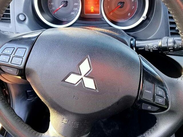 Чорний Міцубісі Lancer, об'ємом двигуна 1.8 л та пробігом 208 тис. км за 6800 $, фото 10 на Automoto.ua