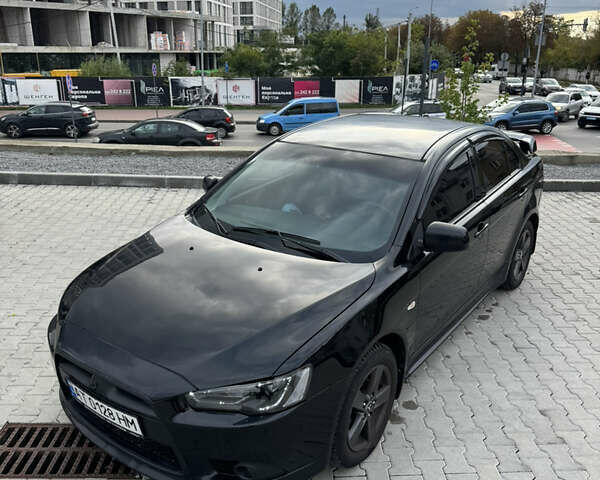 Черный Мицубиси Лансер, объемом двигателя 1.59 л и пробегом 187 тыс. км за 7000 $, фото 3 на Automoto.ua
