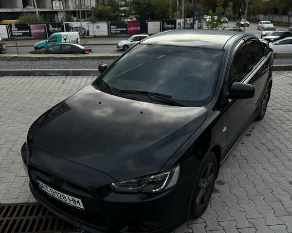 Черный Мицубиси Лансер, объемом двигателя 1.59 л и пробегом 187 тыс. км за 7000 $, фото 6 на Automoto.ua