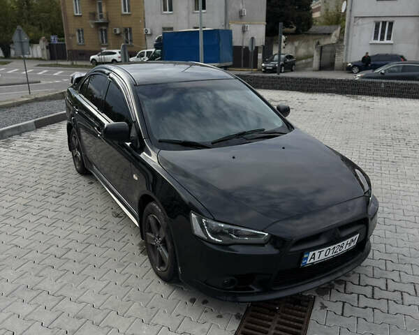 Черный Мицубиси Лансер, объемом двигателя 1.59 л и пробегом 187 тыс. км за 7000 $, фото 5 на Automoto.ua