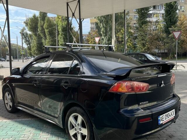 Чорний Міцубісі Lancer, об'ємом двигуна 2 л та пробігом 400 тис. км за 4900 $, фото 5 на Automoto.ua