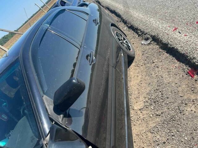 Чорний Міцубісі Lancer, об'ємом двигуна 1.6 л та пробігом 229 тис. км за 2500 $, фото 1 на Automoto.ua