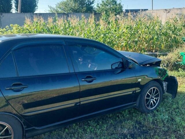 Чорний Міцубісі Lancer, об'ємом двигуна 1.6 л та пробігом 229 тис. км за 2500 $, фото 6 на Automoto.ua