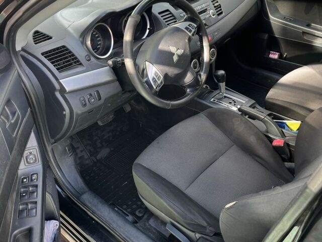 Чорний Міцубісі Lancer, об'ємом двигуна 2 л та пробігом 400 тис. км за 4900 $, фото 10 на Automoto.ua