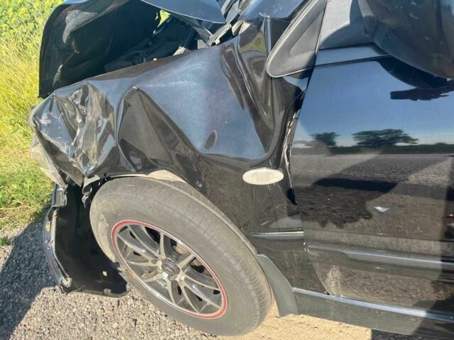 Чорний Міцубісі Lancer, об'ємом двигуна 1.6 л та пробігом 229 тис. км за 2500 $, фото 4 на Automoto.ua