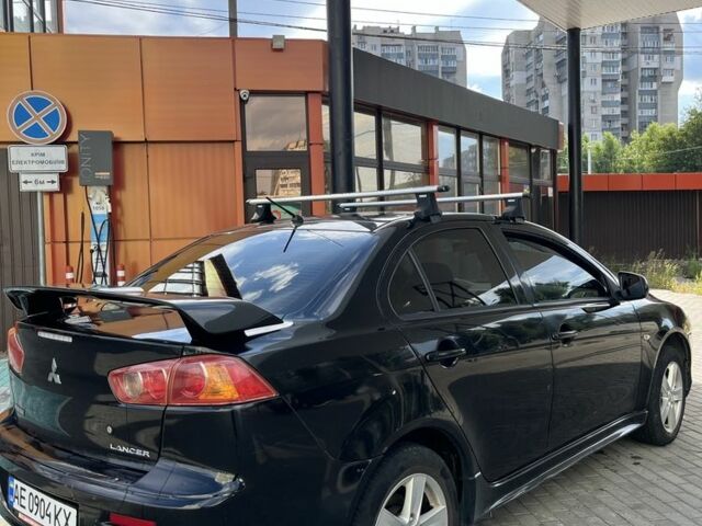 Чорний Міцубісі Lancer, об'ємом двигуна 2 л та пробігом 400 тис. км за 4900 $, фото 3 на Automoto.ua