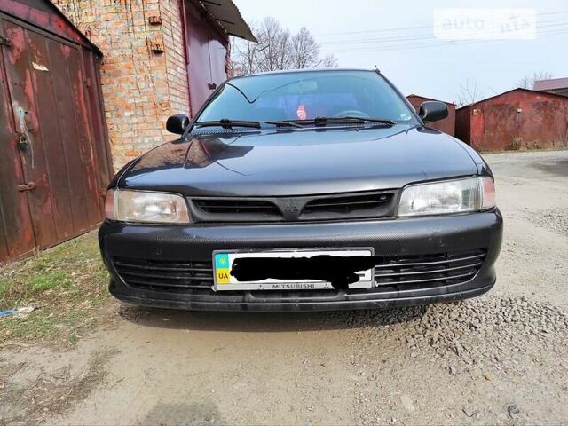 Чорний Міцубісі Lancer, об'ємом двигуна 1.3 л та пробігом 328 тис. км за 3250 $, фото 2 на Automoto.ua