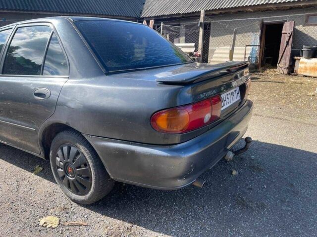 Чорний Міцубісі Lancer, об'ємом двигуна 1.3 л та пробігом 350 тис. км за 2300 $, фото 4 на Automoto.ua