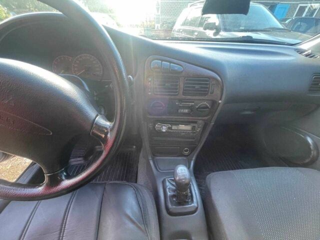 Чорний Міцубісі Lancer, об'ємом двигуна 1.3 л та пробігом 350 тис. км за 2300 $, фото 16 на Automoto.ua