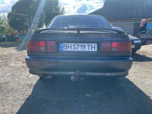 Чорний Міцубісі Lancer, об'ємом двигуна 1.3 л та пробігом 350 тис. км за 2300 $, фото 5 на Automoto.ua