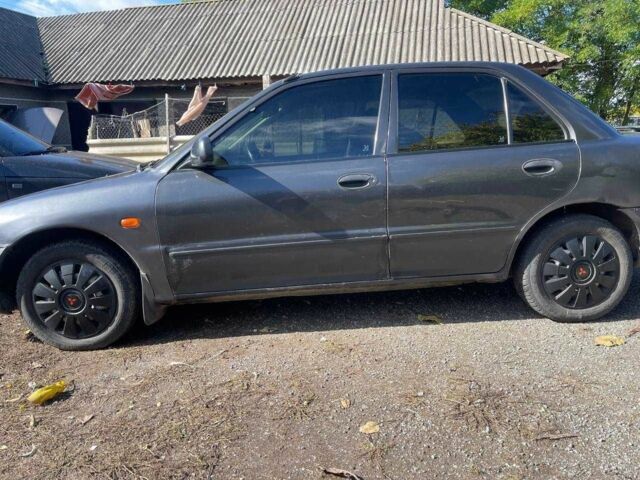 Чорний Міцубісі Lancer, об'ємом двигуна 1.3 л та пробігом 350 тис. км за 2300 $, фото 3 на Automoto.ua