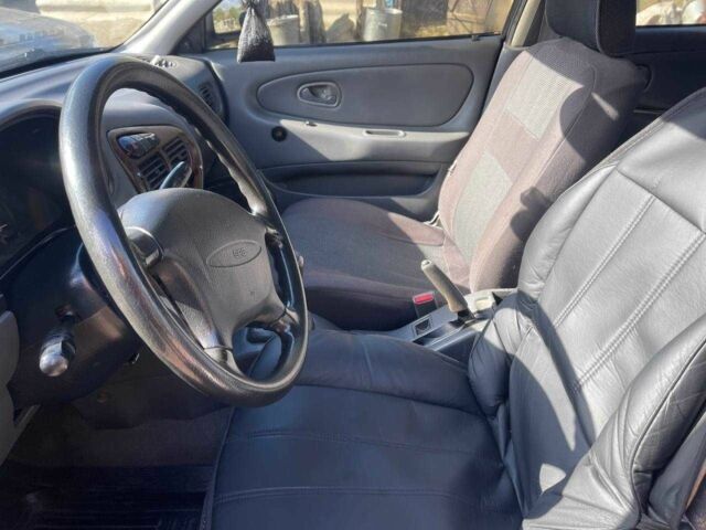 Чорний Міцубісі Lancer, об'ємом двигуна 1.3 л та пробігом 350 тис. км за 2300 $, фото 13 на Automoto.ua
