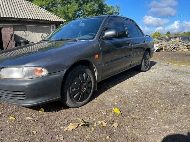 Чорний Міцубісі Lancer, об'ємом двигуна 1.3 л та пробігом 350 тис. км за 2300 $, фото 2 на Automoto.ua