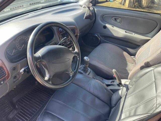 Чорний Міцубісі Lancer, об'ємом двигуна 1.3 л та пробігом 350 тис. км за 2300 $, фото 11 на Automoto.ua