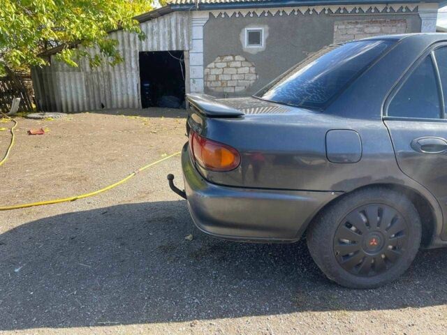 Чорний Міцубісі Lancer, об'ємом двигуна 1.3 л та пробігом 350 тис. км за 2300 $, фото 6 на Automoto.ua