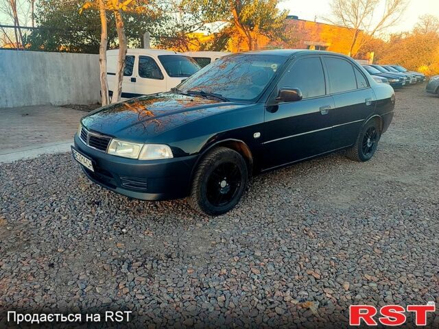 Чорний Міцубісі Lancer, об'ємом двигуна 1.3 л та пробігом 250 тис. км за 2500 $, фото 2 на Automoto.ua