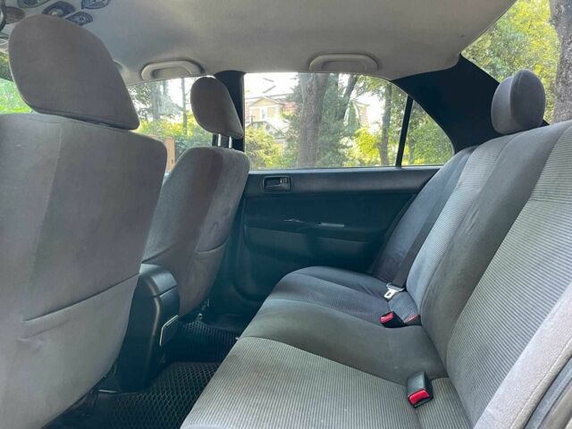 Чорний Міцубісі Lancer, об'ємом двигуна 1.6 л та пробігом 270 тис. км за 6490 $, фото 21 на Automoto.ua