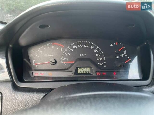 Черный Мицубиси Лансер, объемом двигателя 1.58 л и пробегом 172 тыс. км за 5700 $, фото 7 на Automoto.ua