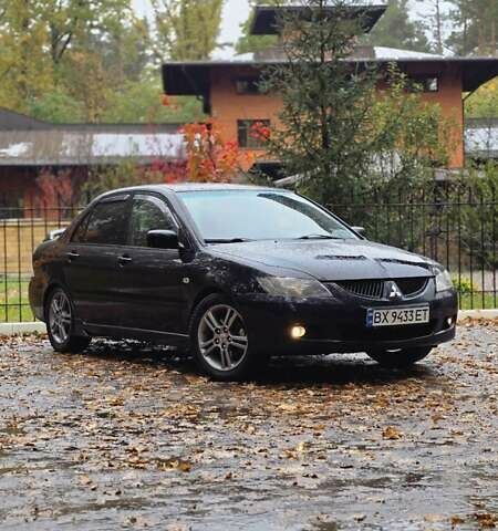 Чорний Міцубісі Lancer, об'ємом двигуна 2 л та пробігом 320 тис. км за 5700 $, фото 3 на Automoto.ua