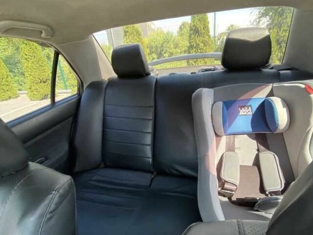 Чорний Міцубісі Lancer, об'ємом двигуна 2 л та пробігом 290 тис. км за 5550 $, фото 4 на Automoto.ua