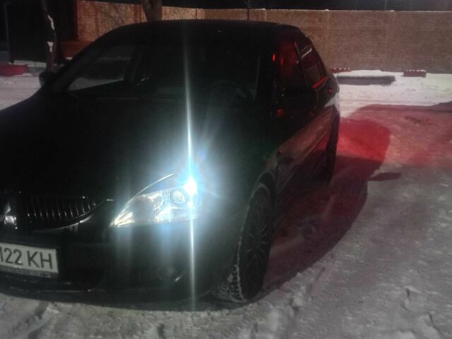 Чорний Міцубісі Lancer, об'ємом двигуна 2 л та пробігом 290 тис. км за 5550 $, фото 6 на Automoto.ua