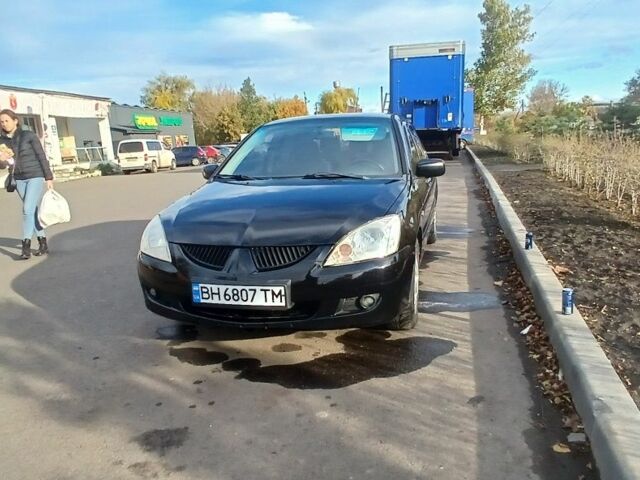 Чорний Міцубісі Lancer, об'ємом двигуна 1.6 л та пробігом 178 тис. км за 2616 $, фото 2 на Automoto.ua