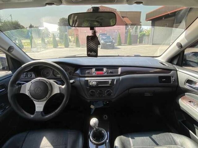Чорний Міцубісі Lancer, об'ємом двигуна 2 л та пробігом 290 тис. км за 5550 $, фото 3 на Automoto.ua
