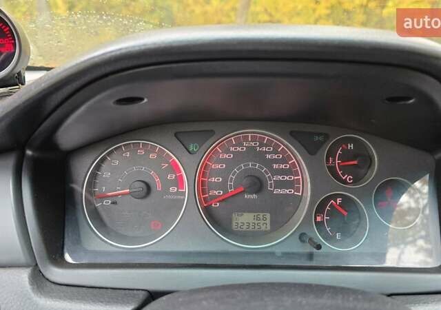 Чорний Міцубісі Lancer, об'ємом двигуна 2 л та пробігом 320 тис. км за 5700 $, фото 4 на Automoto.ua